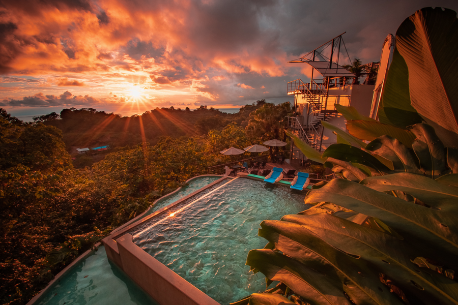 Gaia Hotel & Reserve pool area, main pool, three level infinity pool, sunset - ©.