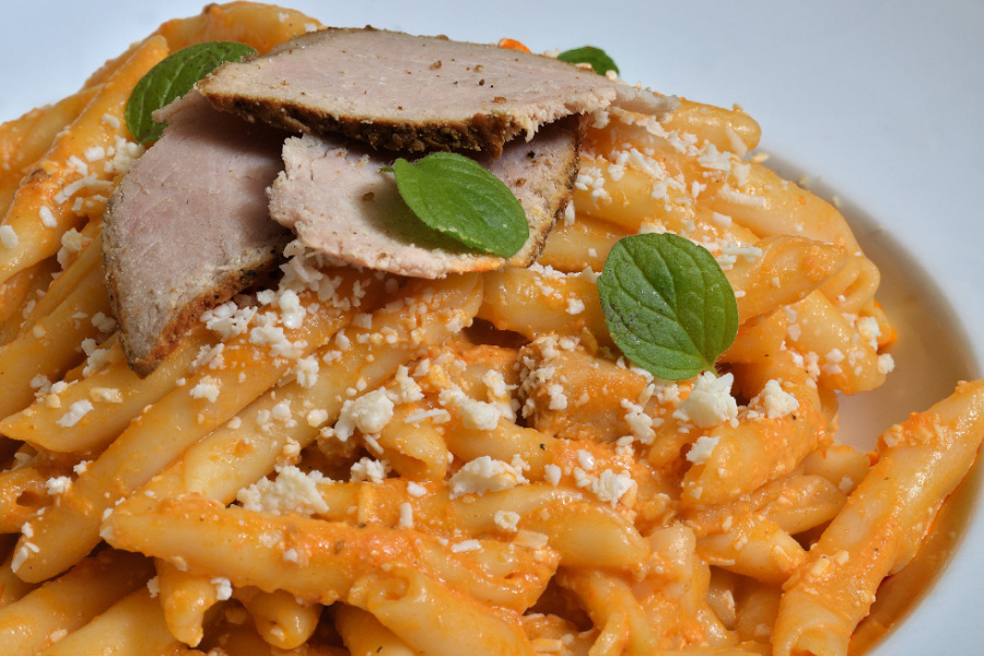Traditional Cretan pasta with cherry tomatoes in fresh tomato sauce & thyme