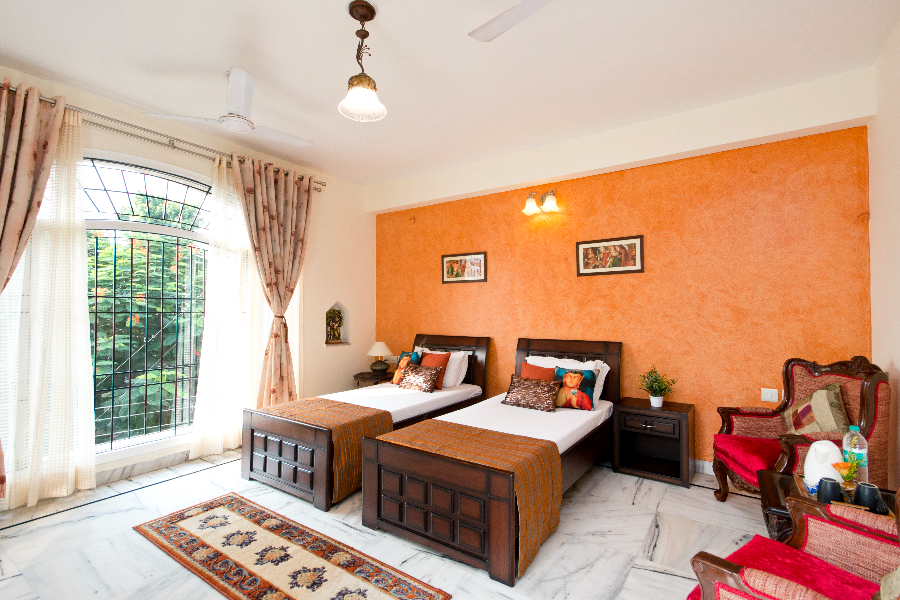 Our large family studio room with attached terrace and private pantry and bathroom. - ©Prakash Kutir B&B