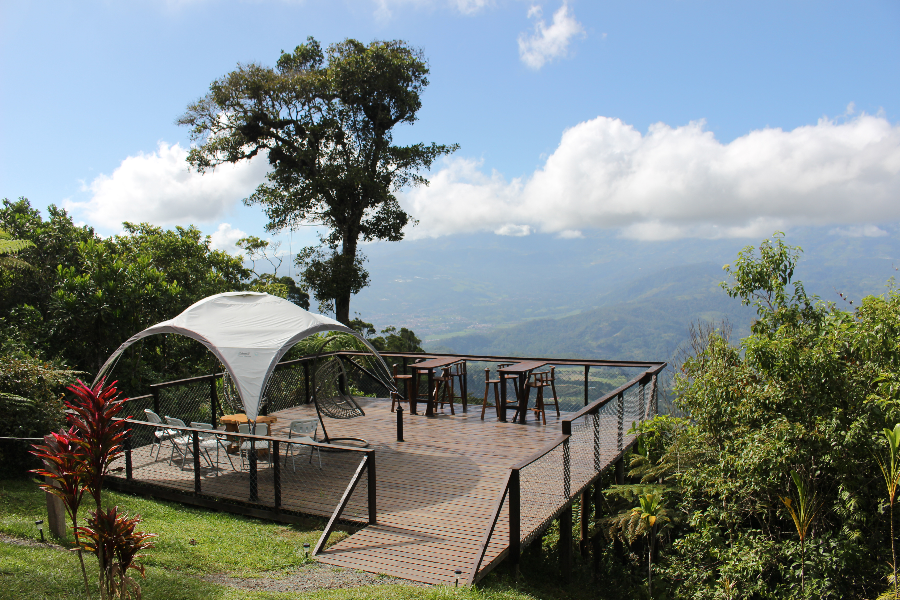 Lodge deck with view on peaceful volcano Turrialba - ©THE LODGE AT REVENTAZON RIVER MOUNTAIN RANCH