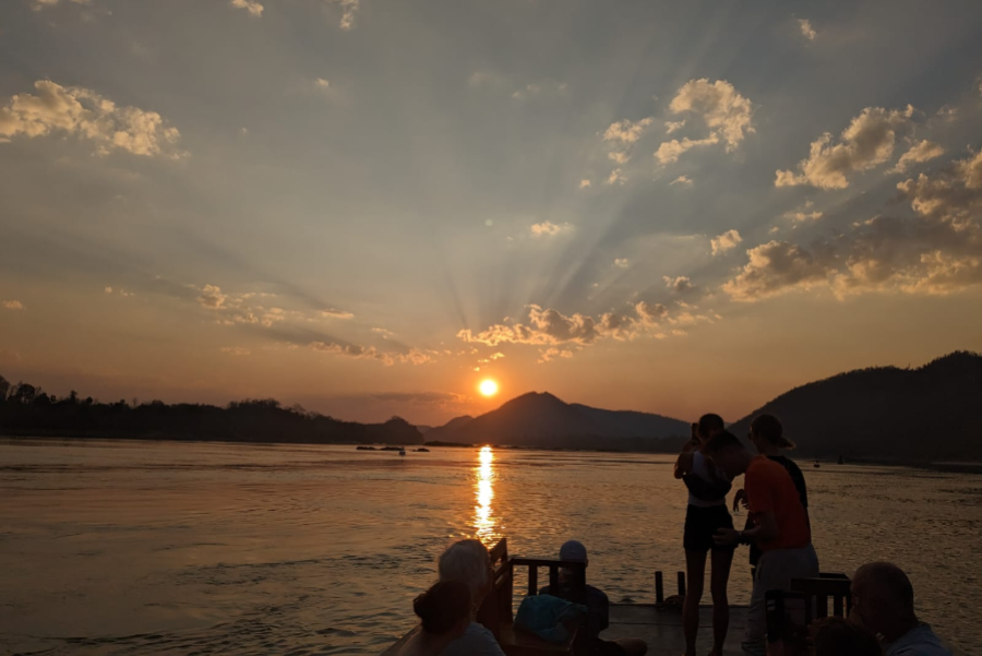 Day tour to Kuang Si Waterfalls and Pak Ou Caves. A sunset cruise to admire the sunset over the Mekong River is the highlight of your trip to Laos. - ©MANIFA TRAVEL