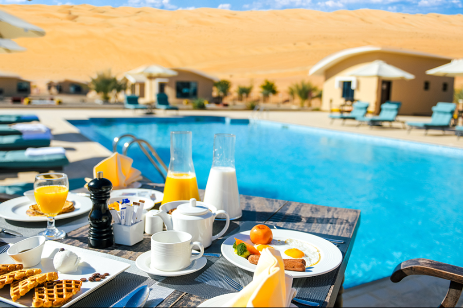 Pool and Food - ©Arabian Nights Resort & Spa