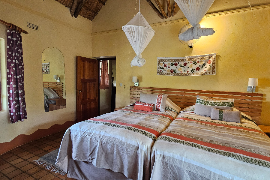 Large twin beds in bedrooms. - ©Musangano Lodge