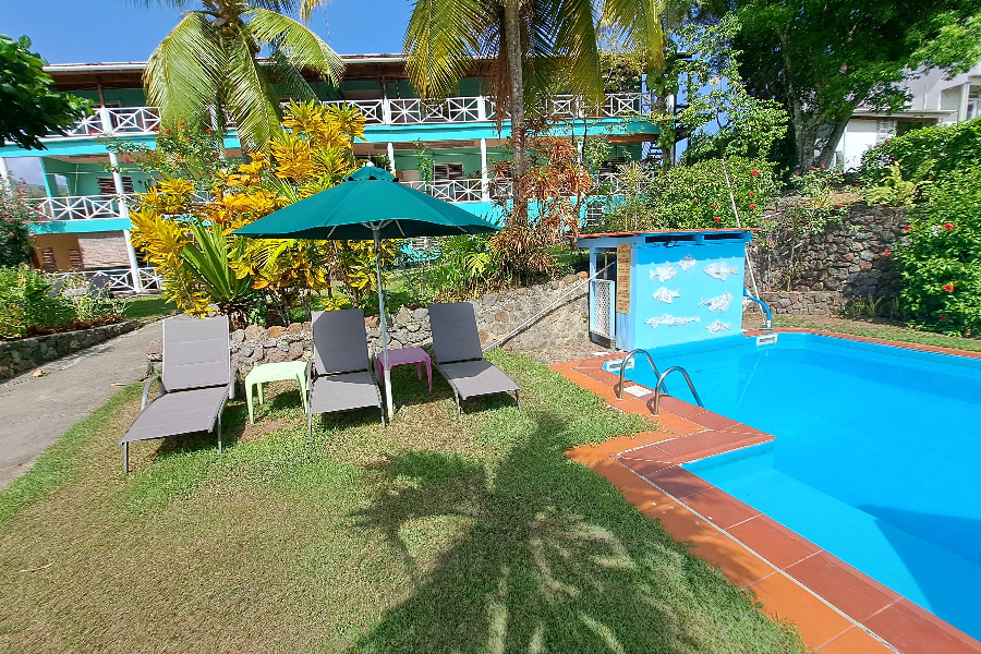 jardin et piscine - ©TAMARIND TREE HOTEL