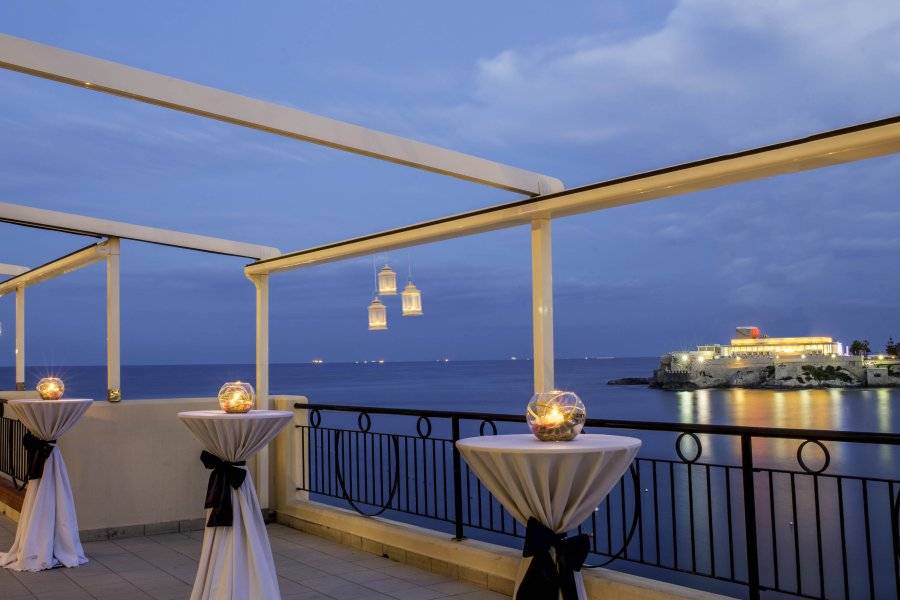 terrace at night - ©MARINA HOTEL CORINTHIA BEACH RESORT